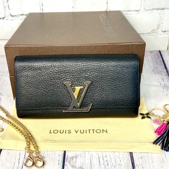 Louis Vuitton Handbags - ⭐️Louis Vuitton Capucines black leather wallet or crossbody with bag charm